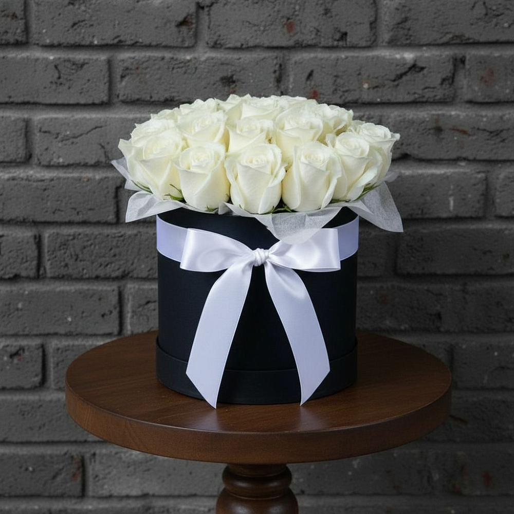 Цветочная композиция из Розы в шляпной коробке в Комсомольске Ивановской области